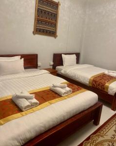 Postel nebo postele na pokoji v ubytování Meet Sunset Villa Luang Prabang + 28 fotografií