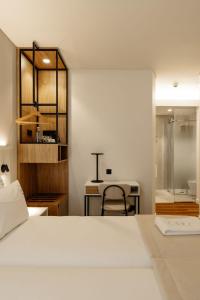 Una cama o camas en una habitación de Livô Boutique Living