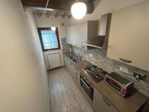 Kuchyň nebo kuchyňský kout v ubytování Il casale del Trebbio