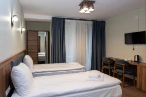 Ένα ή περισσότερα κρεβάτια σε δωμάτιο στο Hotel - Jodi Lare +15 φωτογραφίες