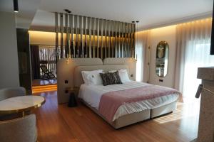 Giường trong phòng chung tại Quinta Solar das Fontes +84 ảnh