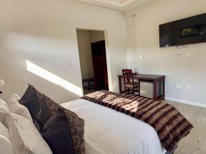 Giường trong phòng chung tại 19 on Bay Noakes +2 ảnh