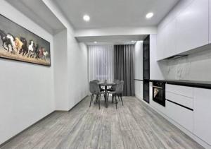 Kuchyň nebo kuchyňský kout v ubytování Modern Apartment