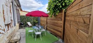 Κήπος έξω από το La Maisonnette en Medoc