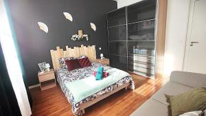 Postel nebo postele na pokoji v ubytování Cosy Vénus - T3 - balcon & Stationnement gratuit