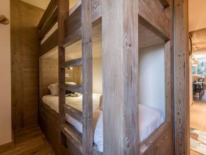 Voodi või voodid majutusasutuse Appartement moderne Courchevel 1550 - 6 pers - Centre village - Parking - WiFi - FR-1-631-233 toas