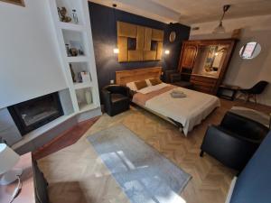 Ένα ή περισσότερα κρεβάτια σε δωμάτιο στο Willa Pod Basztą Restauracja&Wellness