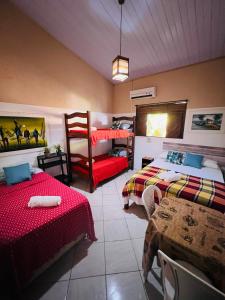 Ένα ή περισσότερα κρεβάτια σε δωμάτιο στο Casa Kuki's