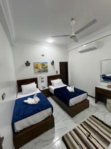 Postel nebo postele na pokoji v ubytování Sama Stars Guest House