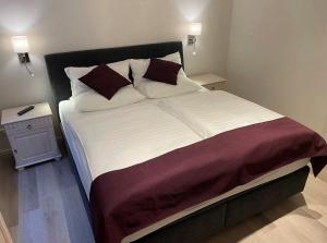 Voodi või voodid majutusasutuse Seaside-Amrum-8 toas