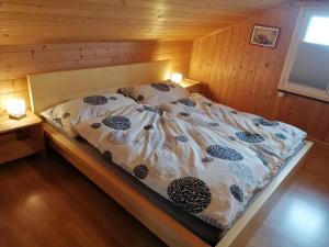 Postel nebo postele na pokoji v ubytování Rheintalblick