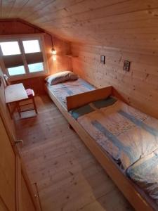 Postel nebo postele na pokoji v ubytování Rheintalblick