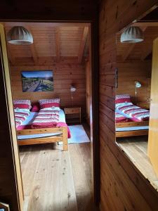 Giường trong phòng chung tại Chalet Traumfleck