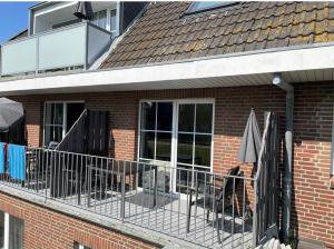 Rõdu või terrass majutusasutuses Seaside-Amrum-9 +1 foto