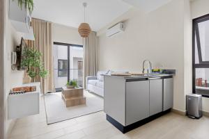 Η κουζίνα ή μικρή κουζίνα στο Tropical Escape