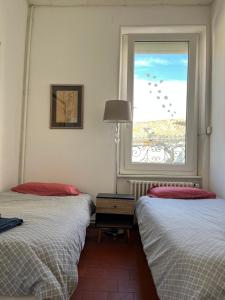 Postel nebo postele na pokoji v ubytování Les Chambres des Barques + 20 fotografií