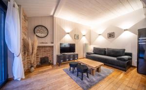 Posezení v ubytování L'Atelier des Rêves