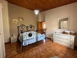 Postel nebo postele na pokoji v ubytování B&B A Casa di Nonna