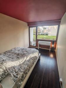 Una cama o camas en una habitación de La Fresque