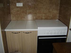 Kuchyň nebo kuchyňský kout v ubytování Gemütliches Appartment Direkt Am Strand + 14 fotografií