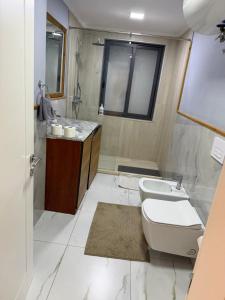 Koupelna v ubytování Square inn 9 + 21 fotografií