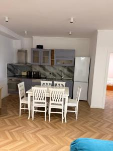 Kuchyň nebo kuchyňský kout v ubytování Square inn 9