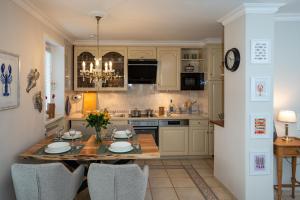 Η κουζίνα ή μικρή κουζίνα στο Sylter Seestern App Wattglück +12 φωτογραφίες