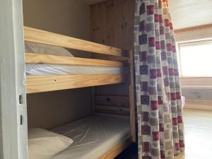 Postel nebo postele na pokoji v ubytování Studio montagne