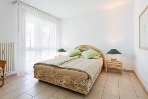 Ένα ή περισσότερα κρεβάτια σε δωμάτιο στο Golf Ranch, 1Er Stock