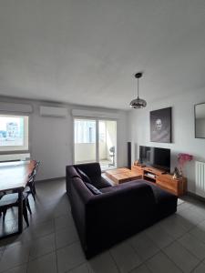 Χώρος καθιστικού στο Appartement 3 pièces + terrasse