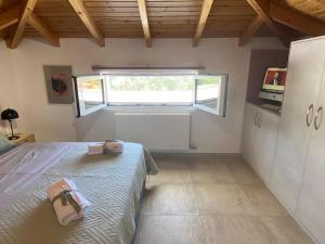 Postel nebo postele na pokoji v ubytování Ακτή Βολέρι panoramic view suite-parking-5g wifi