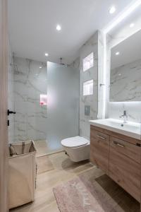 Koupelna v ubytování The Neptunian Suite Residence