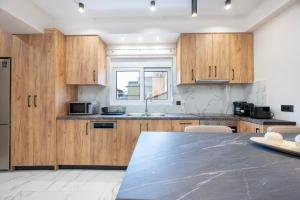 Kuchyň nebo kuchyňský kout v ubytování The Neptunian Suite Residence + 41 fotografií