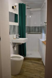 Ένα μπάνιο στο Guest House Rifugio Urbano