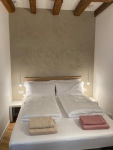 Кровать или кровати в номере Trieste City 2