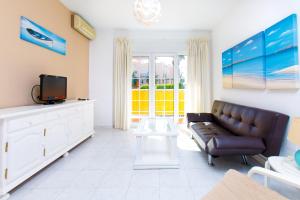 TV a/nebo společenská místnost v ubytování Apto 2 Almoraide Suites