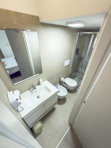 Koupelna v ubytování MyRoom + 18 fotografií