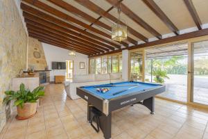 a living room with a pool table in it at Villa Marilen in Alcudia