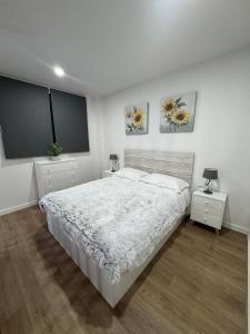 Ένα ή περισσότερα κρεβάτια σε δωμάτιο στο Roomy Estudio