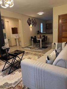 Posezení v ubytování LionsGate Homes