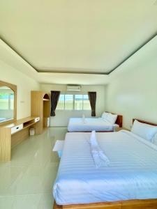 Postel nebo postele na pokoji v ubytování Le poulet poolvilla khanom