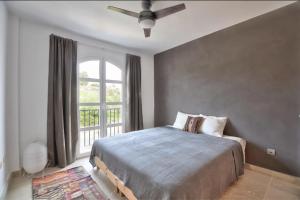 Postel nebo postele na pokoji v ubytování Casa Maria Luisa