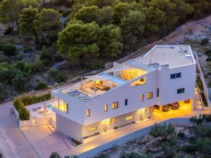an aerial view of a white house at Villa Nexia Šibenik in Šibenik