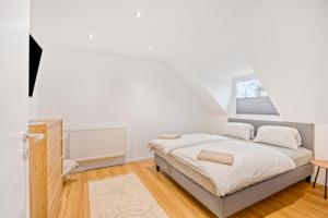 Voodi või voodid majutusasutuse Zentral gelegen in Haan - 4 Schlafzimmer- Bis zu 7 Personen toas