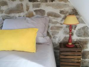 Postel nebo postele na pokoji v ubytování Gite Des Ajoncs