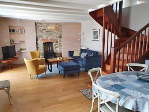 Posezení v ubytování Gite Des Roseaux