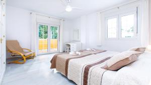 Postel nebo postele na pokoji v ubytování Apto 3 Almoraide Suites