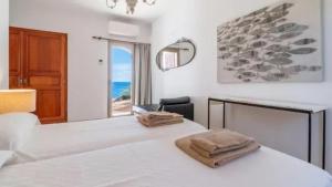 Postel nebo postele na pokoji v ubytování Can Ferrando - Es Pontàs