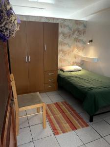 En eller flere senge i et værelse på Céntrico, acogedor + 4 billeder