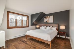 Ένα ή περισσότερα κρεβάτια σε δωμάτιο στο Chalet 24 Chemin des Skieurs